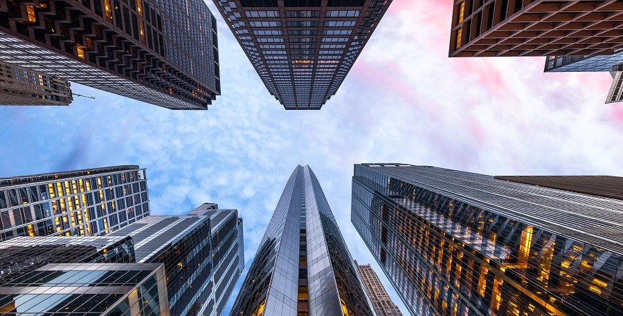 Picture of skyscrapers pointing up toward the sky