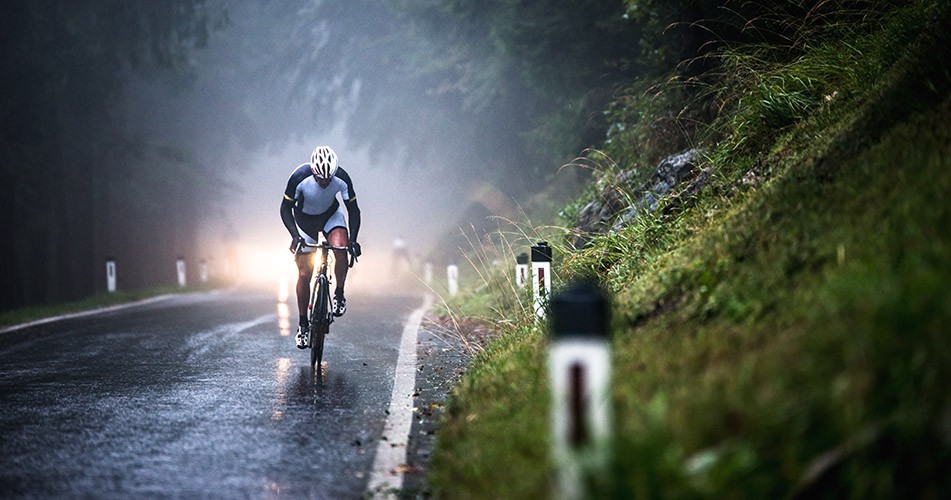 Picture of a cyclist on a wet road