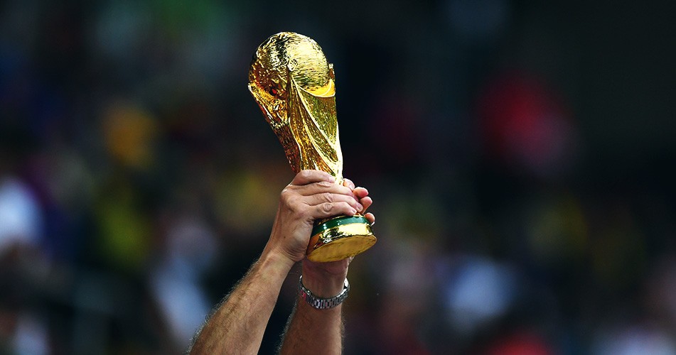 Picture of someone holding the world cup