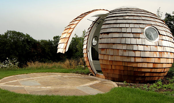 Futuristic spherical hut with door that opens upwards