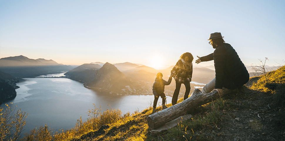 Family hiking in swiss mountains