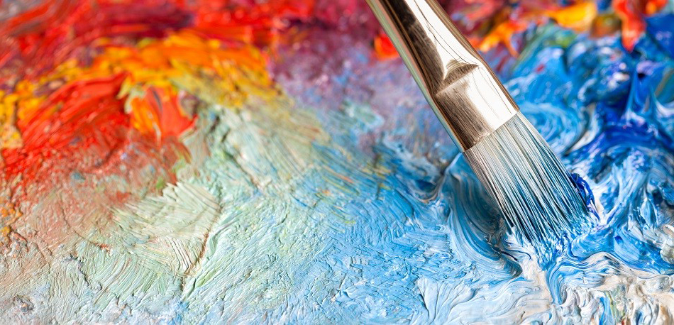 Close-up of paint brush on canvas