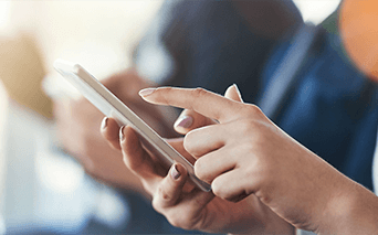 Person typing on mobile phone