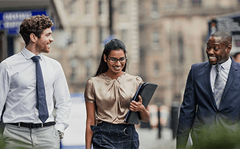 Business men and woman having street meeting