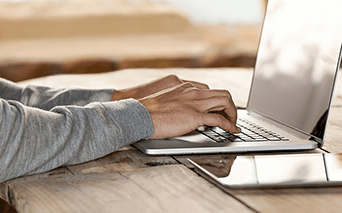 Person typing on laptop 