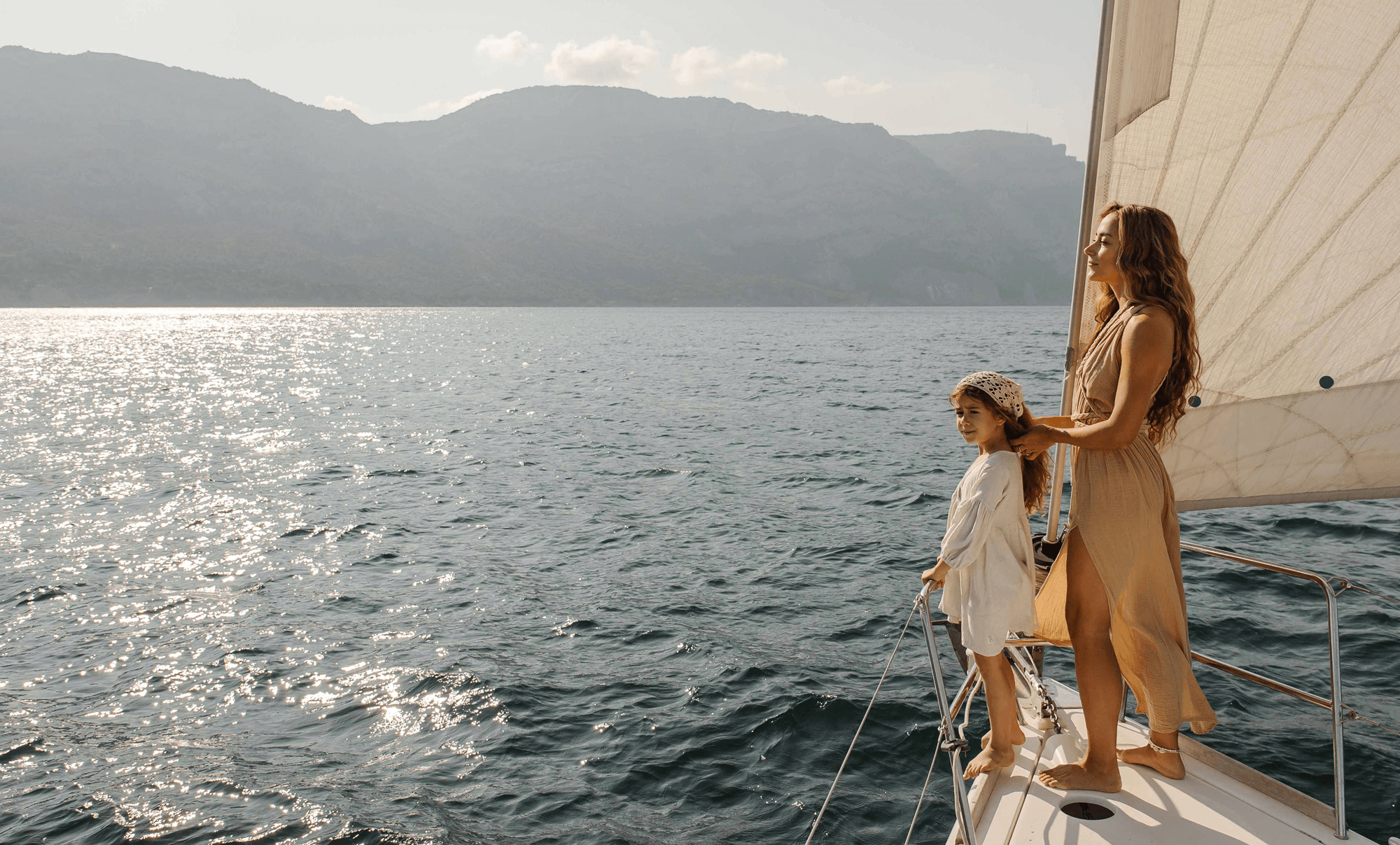 Lady and daughter on yacht